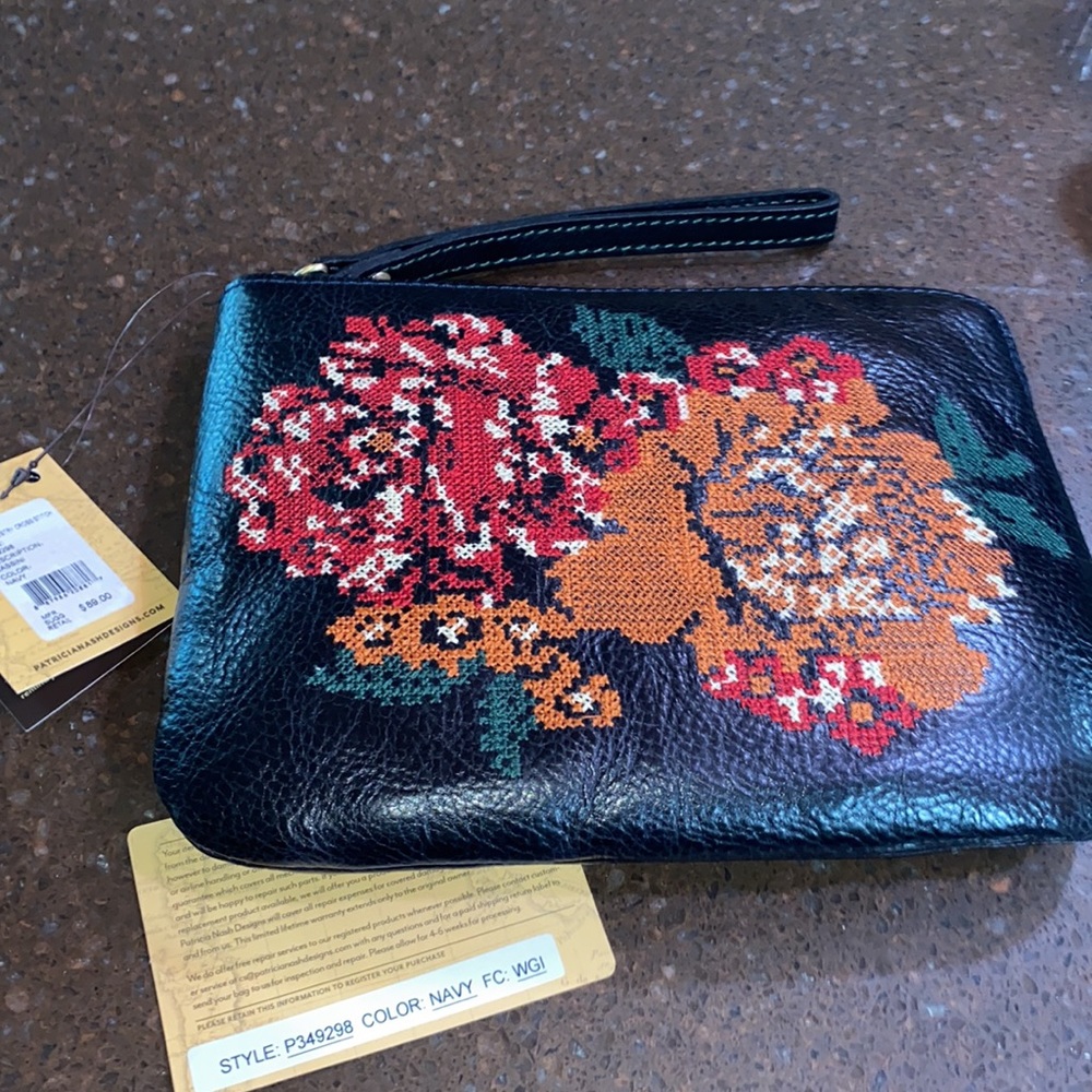 Very nice Patricia Nash large wristlet new with tag